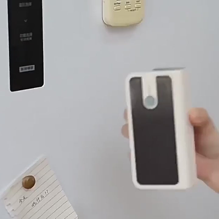Sticking the sealer to a fridge door with its magnetic back